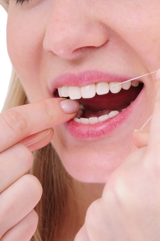 flossing-dentist-newport-beach