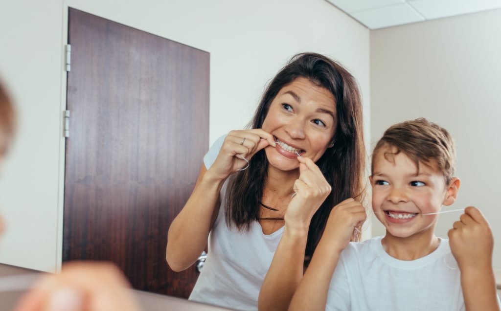 Dentist Newport Beach: Flossing For Greater Oral Health